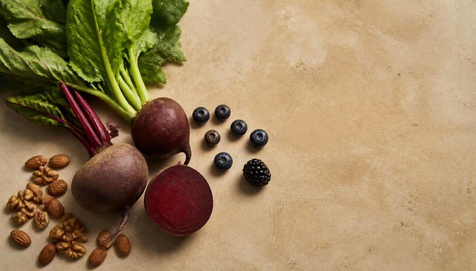 Fresh beetroot, arugula, spinach, leafy lettuce and celery arranged as natural dietary sources of nitrate